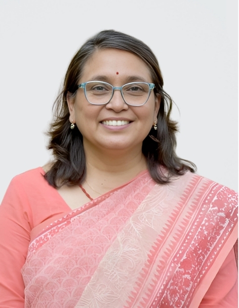 Nidhi B